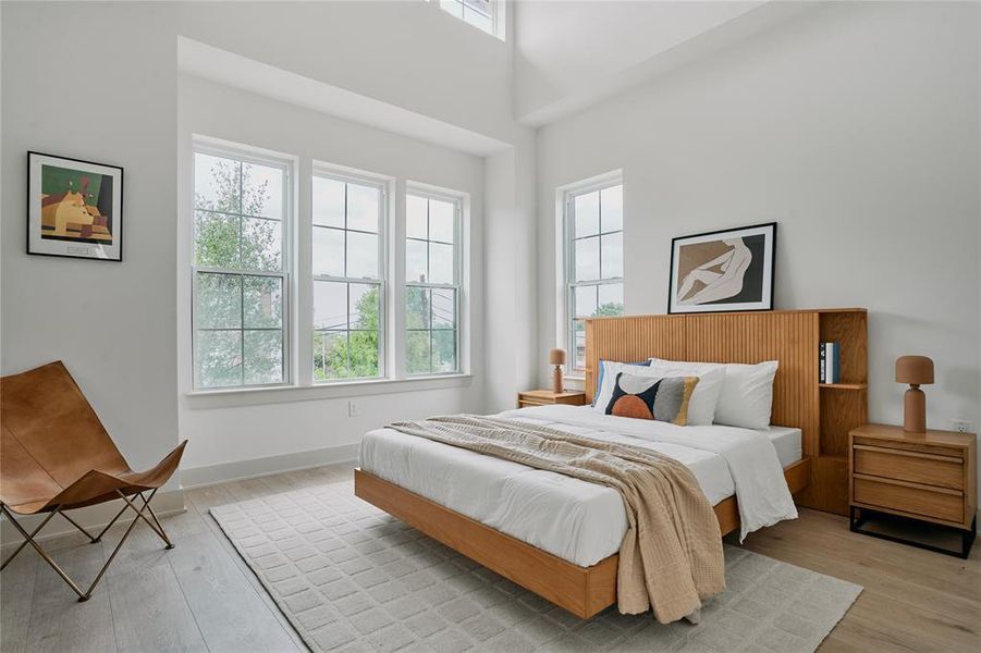 Bedroom featuring light wood-finish flooring and white walls