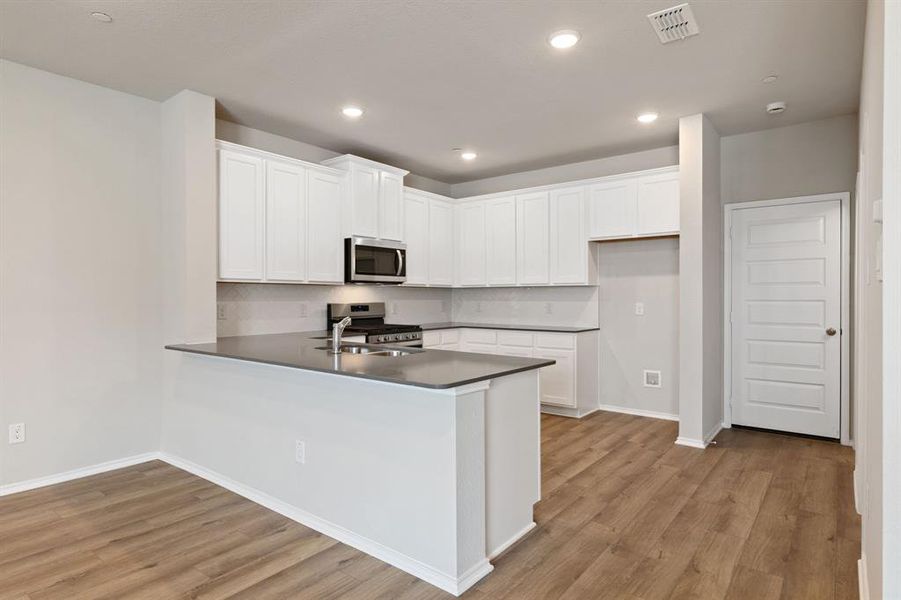 Furnished interior view inside a new home in Heartland Townhomes, Heartland (Image 5).
