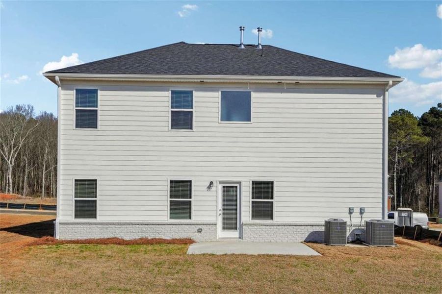 Exterior details and patio area of a home in Conner Springs, Social Circle (Image 3).