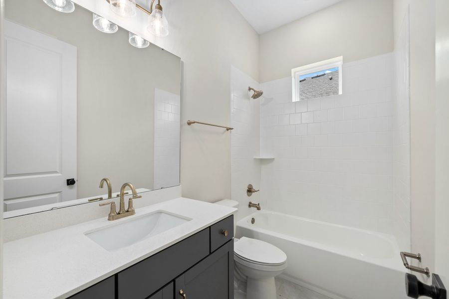 Representative furnished interior of a home built from the Aurora by Riverside Homes in Hidden Creek at SilverLeaf, St. Augustine (Image 5).