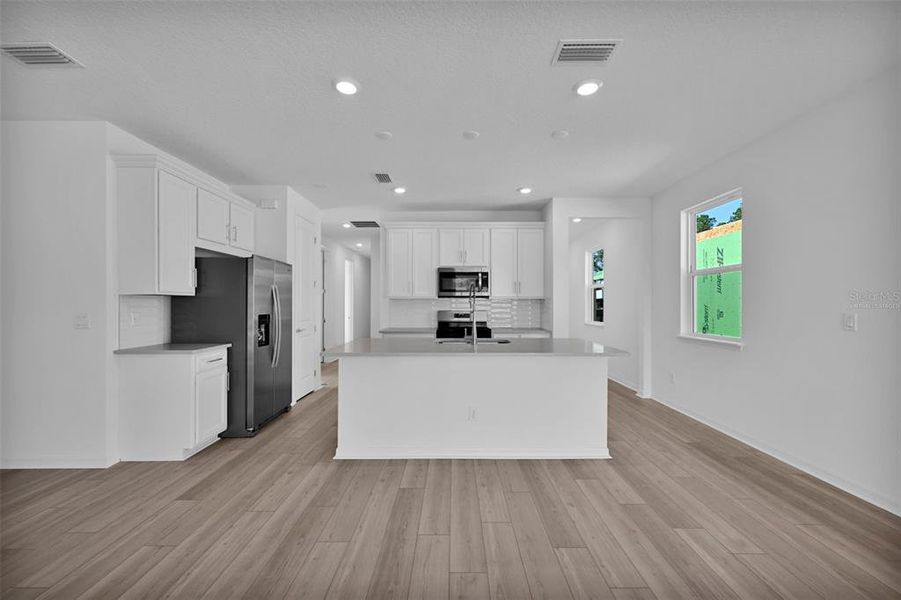 Furnished interior view inside a new home in Seminole Palms, Palm Coast (Image 6). Furnished interior view inside a new home in Seminole Palms, Palm Coast (Image 6).
