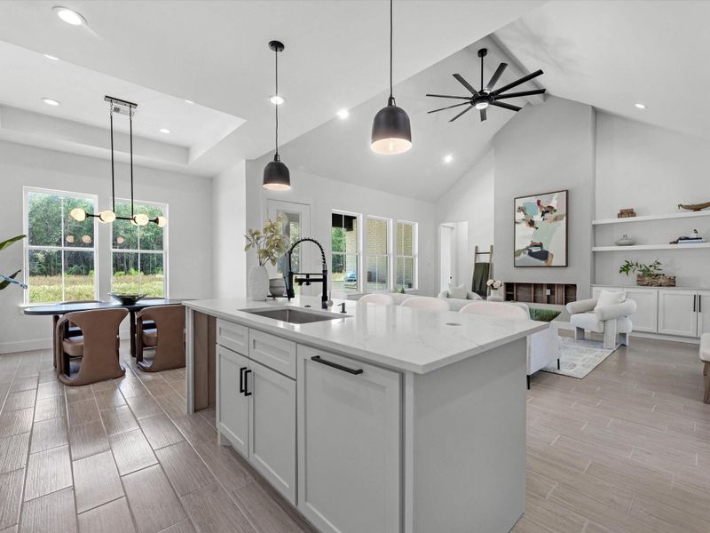 Stunning kitchen, with custom cabinetry, hidden walk in pantry, luxury appliances, and tasteful finishes. Stunning kitchen, with custom cabinetry, hidden walk in pantry, luxury appliances, and tasteful finishes.
