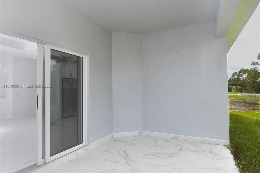 Exterior details and patio area of a home in , Lehigh Acres (Image 25). Exterior details and patio area of a home in , Lehigh Acres (Image 25).