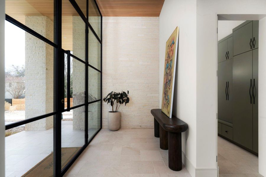 Hallway featuring floor to ceiling windows