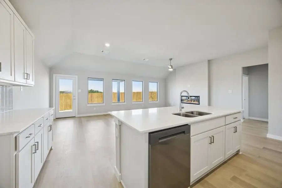Representative furnished interior of a home built from the The Elm by Lillian Custom Homes in Hickory Hill, Sherman (Image 11).