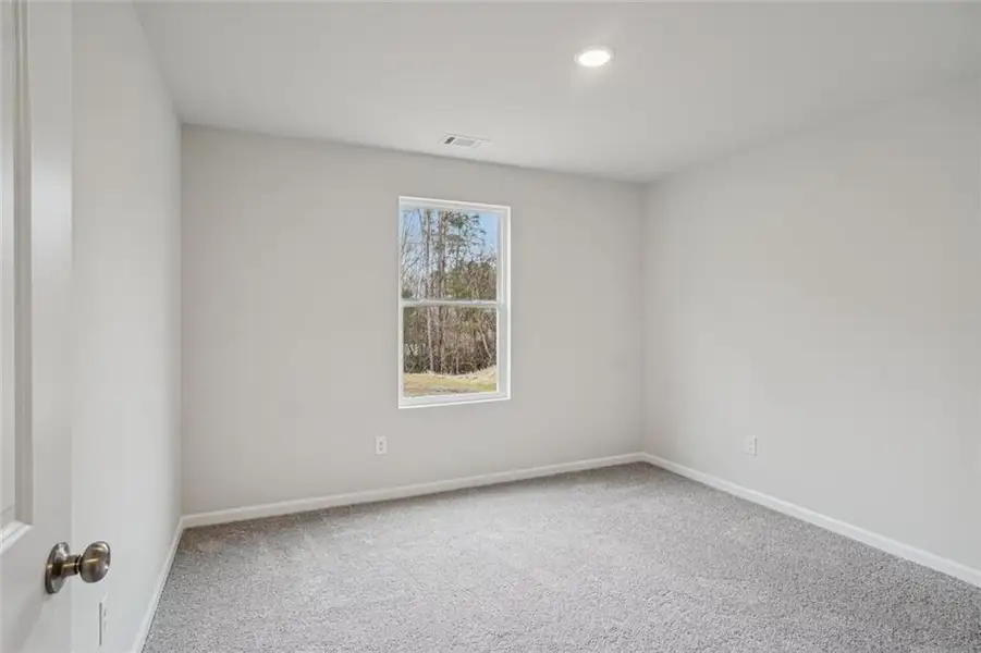 Spacious, unfurnished interior of a new home in Liberty Pointe, Villa Rica (Image 11).