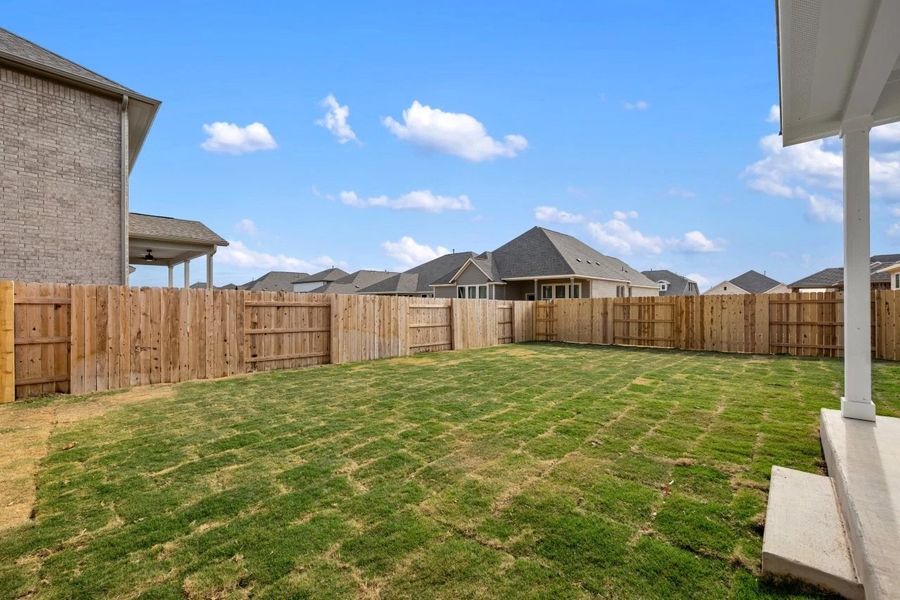 Exterior details and patio area of a home in Berry Creek Highlands, Georgetown (Image 26).