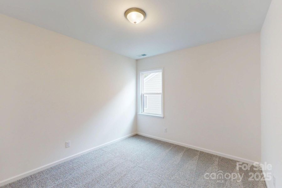 Upper level secondary bedroom Upper level secondary bedroom