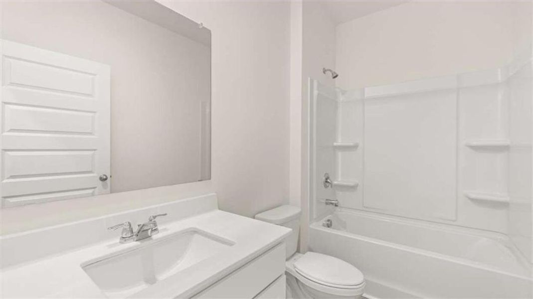 Furnished interior view inside a new home in Oakchase at Hampton, Hampton (Image 14).