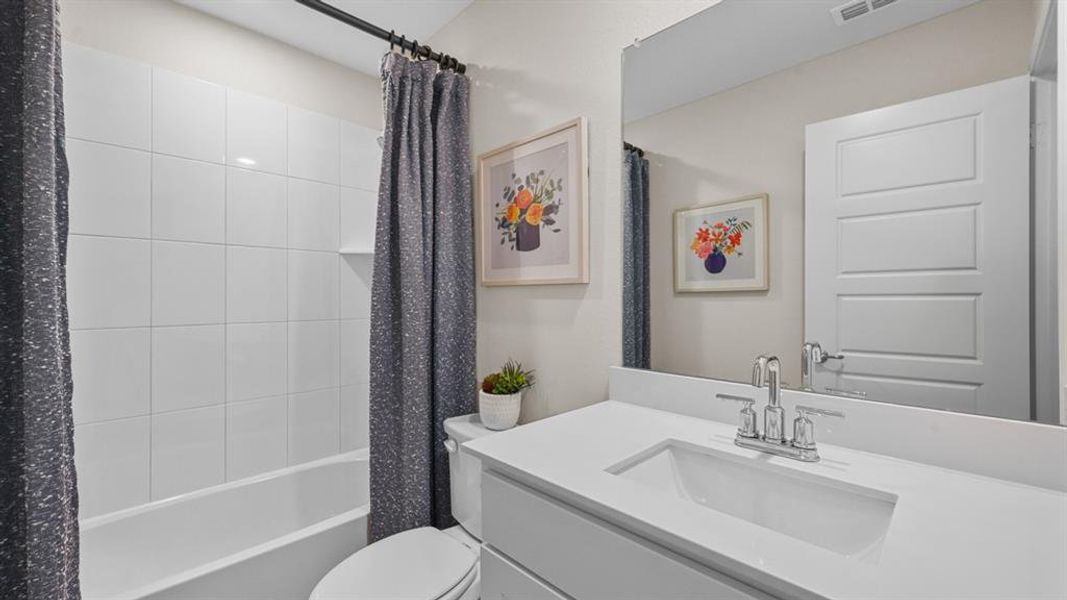 Full bath with shower / tub combo with curtain and vanity Full bath with shower / tub combo with curtain and vanity