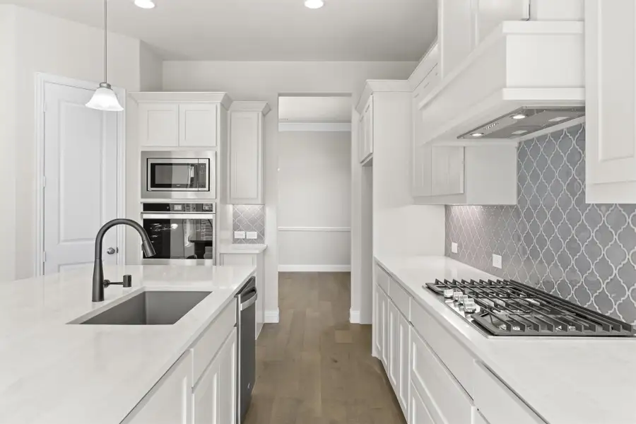 Representative furnished interior of a home built from the Portsmouth by Windsor Homes in Nelson Lake Estates, Rockwall (Image 11).