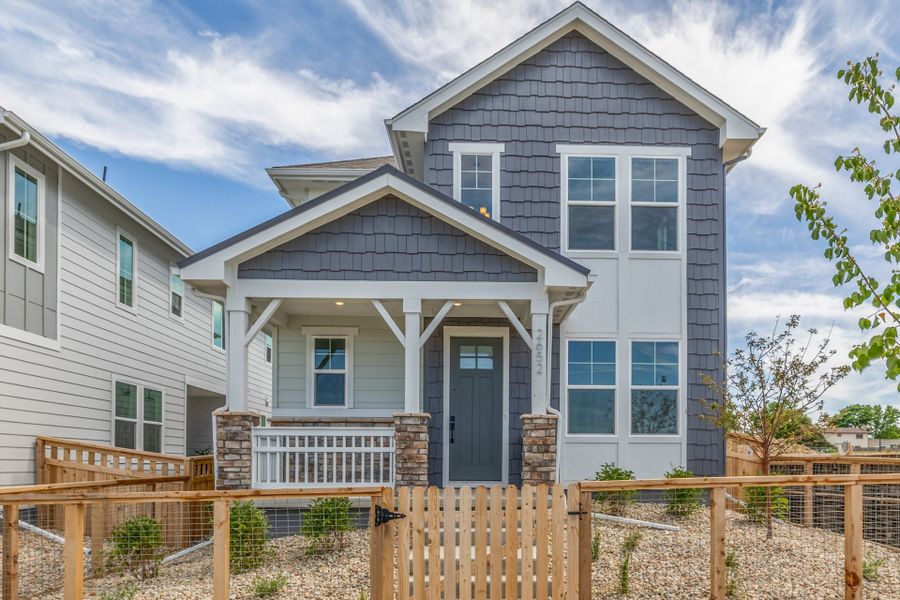 Front exterior of a new home in Arras Park, Thornton, CO, highlighting curb appeal (Image 2).
