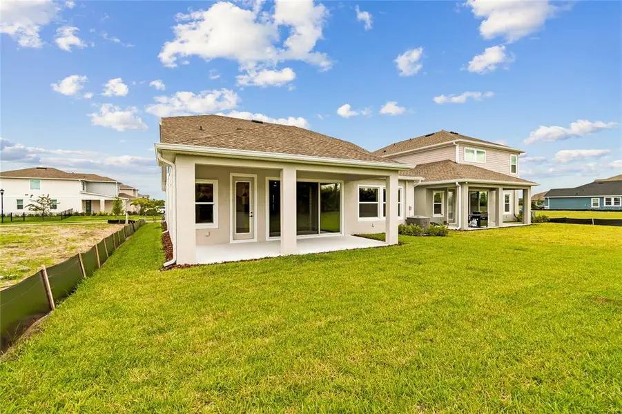 Exterior details and patio area of a home in Waterset Classic Series, Apollo Beach (Image 20).
