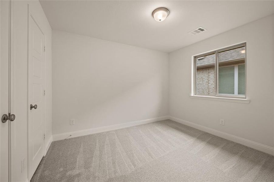 Spacious, unfurnished interior of a new home in The Reserve at Spiritas Ranch, Little Elm (Image 15).