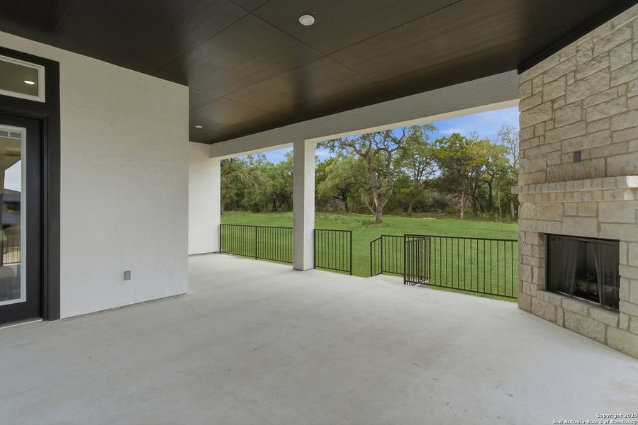 Exterior details and patio area of a home in Heimer Estates at Garden Ridge, San Antonio (Image 29).