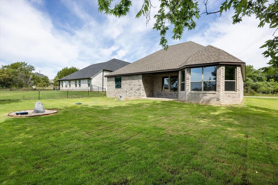 Exterior details and patio area of a home in , Granbury (Image 4). Exterior details and patio area of a home in , Granbury (Image 4).