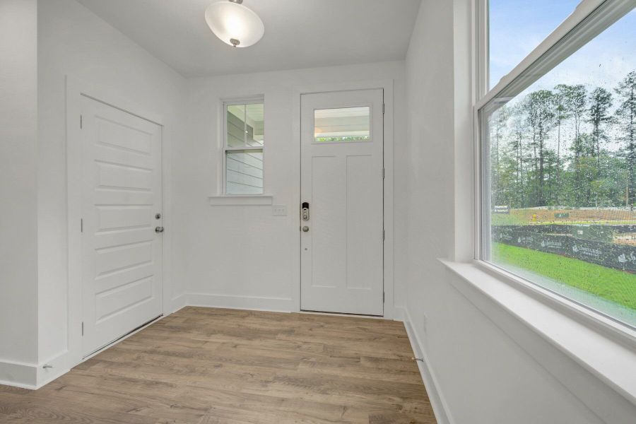 Spacious, unfurnished interior of a new home in Ashmore Townes, Garner (Image 8). Spacious, unfurnished interior of a new home in Ashmore Townes, Garner (Image 8).