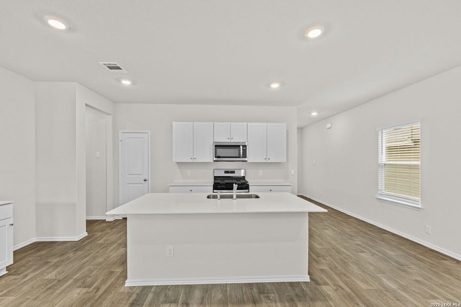 Furnished interior view inside a new home in Applewood, San Antonio (Image 8).