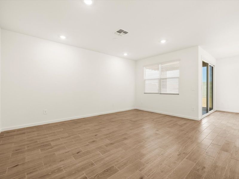 Spacious, unfurnished interior of a new home in Bella Vista Farms Estate Series, San Tan Valley (Image 6).