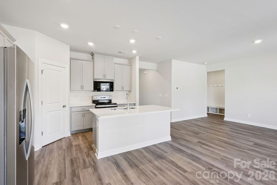 Furnished interior view inside a new home in Harper Landing, Stanley (Image 4).