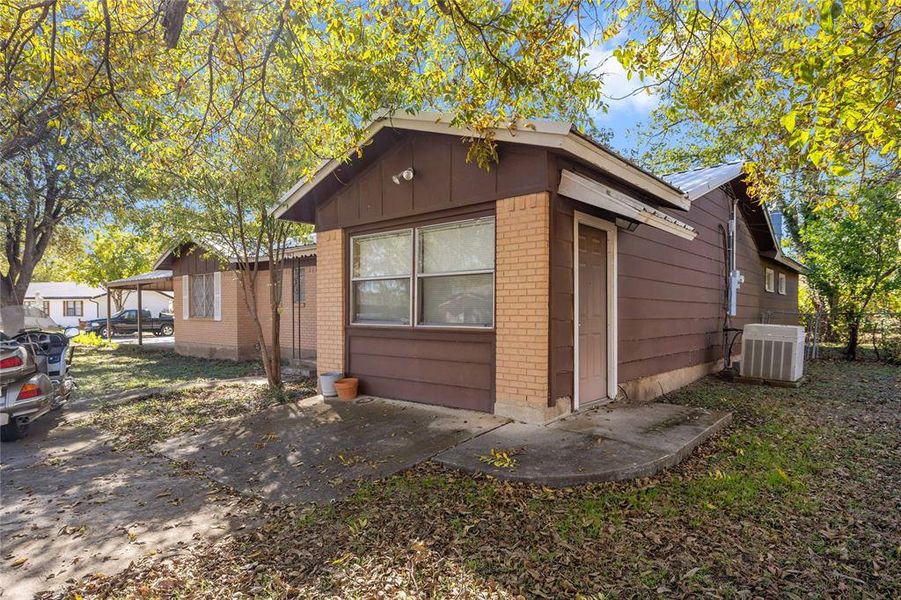 Exterior details and patio area of a home in , Brownwood (Image 21).