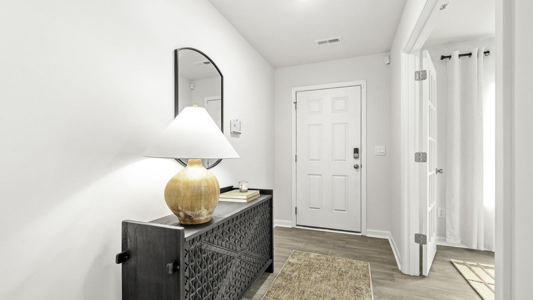 Representative furnished interior of a home built from the Hayden by D.R. Horton in Brookhaven, Greensboro (Image 8).