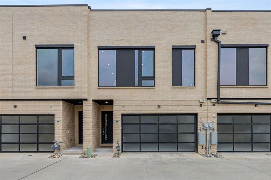 View of property with a garage