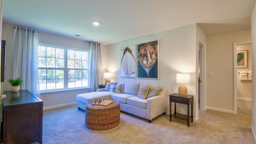 Furnished interior view inside a new home in Beaver Dam Crossing, Bailey (Image 31). Furnished interior view inside a new home in Beaver Dam Crossing, Bailey (Image 31).