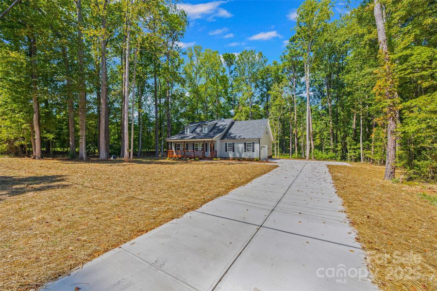 Front exterior of a new home in , Rock Hill, SC, highlighting curb appeal (Image 15).