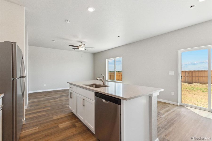 Furnished interior in a model home at Bennett Ranch in Bennett (Image 4).