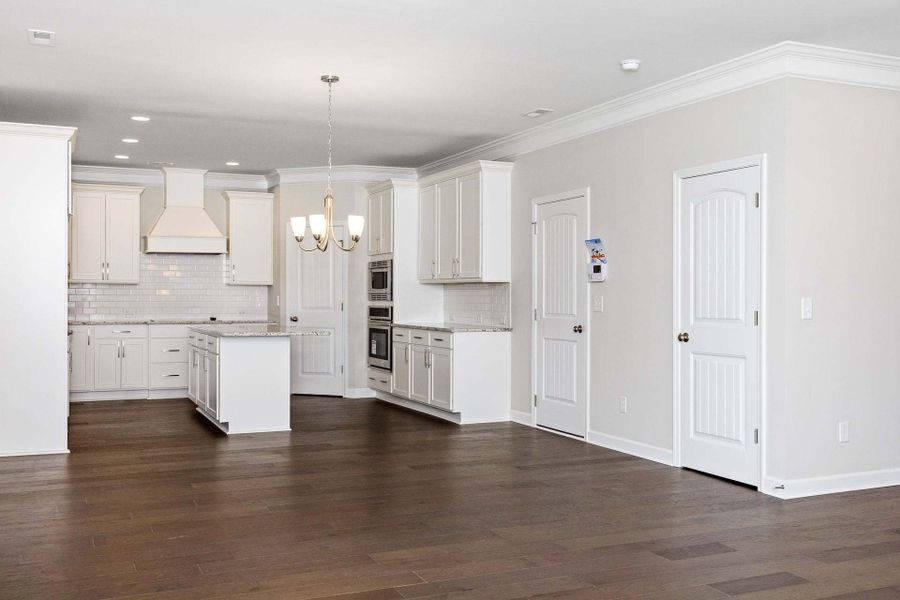 Gourmet kitchen layout with vent hood option.