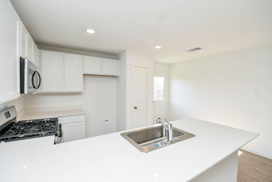 Furnished interior view inside a new home in Ladera Trails, Conroe (Image 14).