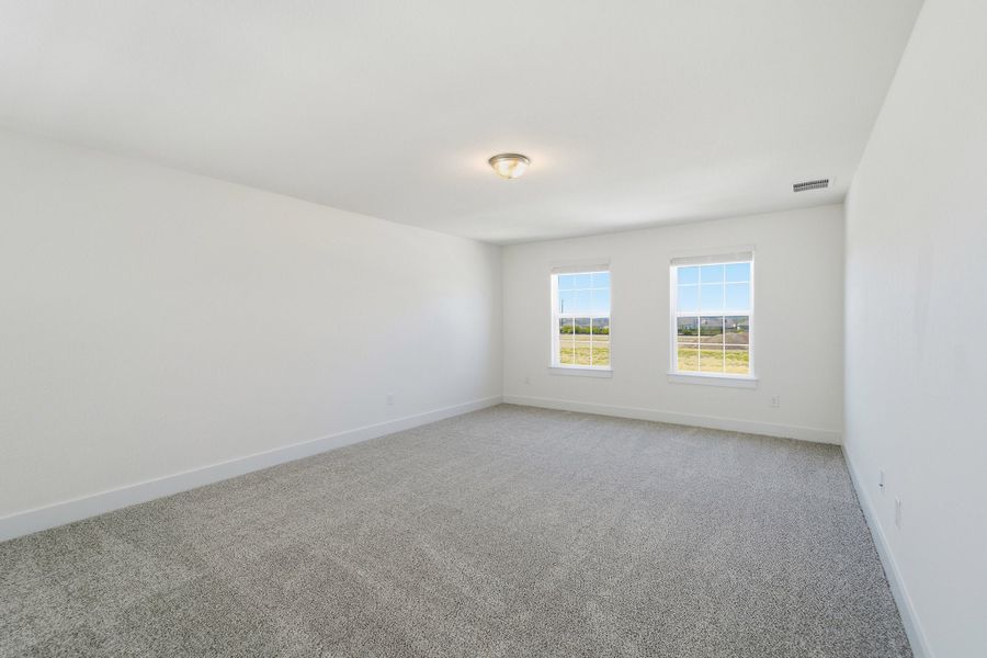 Spacious, unfurnished interior of a new home in Red Hawk Landing, San Antonio (Image 61).
