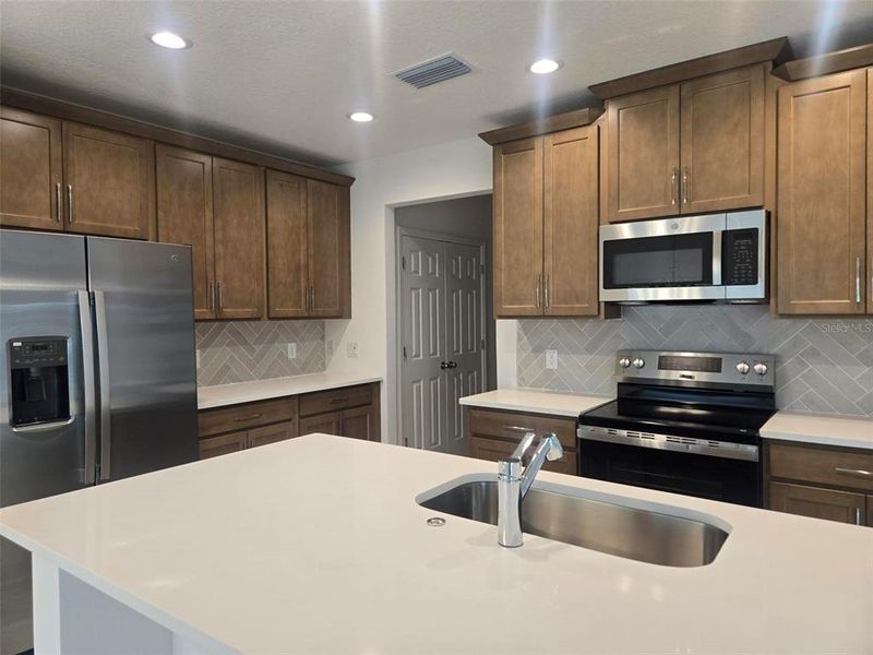 Furnished interior view inside a new home in Preservation Pointe, Davenport (Image 2).