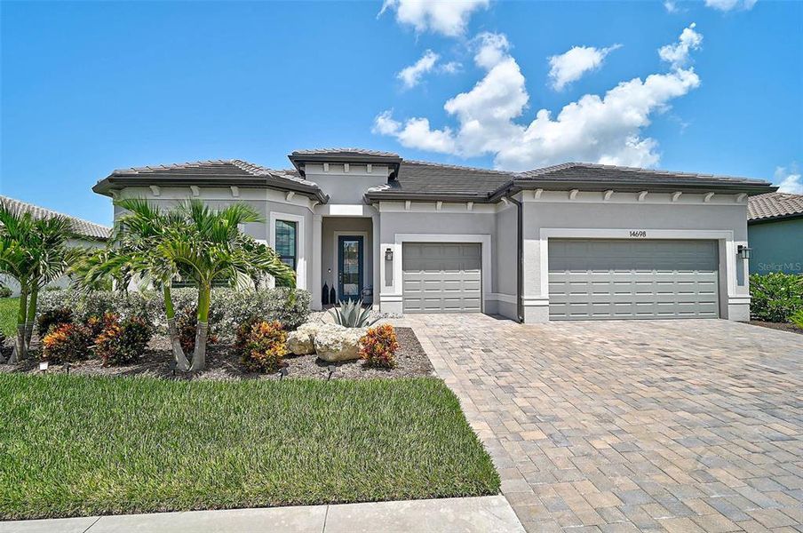 Front exterior of a new home in , Nokomis, FL, highlighting curb appeal (Image 23). Front exterior of a new home in , Nokomis, FL, highlighting curb appeal (Image 23).