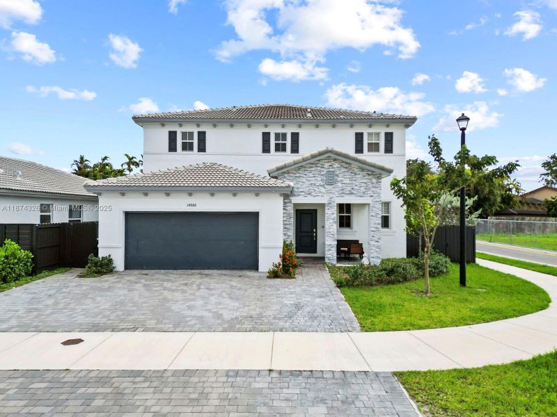 Front exterior of a new home in , Miami, FL, highlighting curb appeal (Image 24). Front exterior of a new home in , Miami, FL, highlighting curb appeal (Image 24).