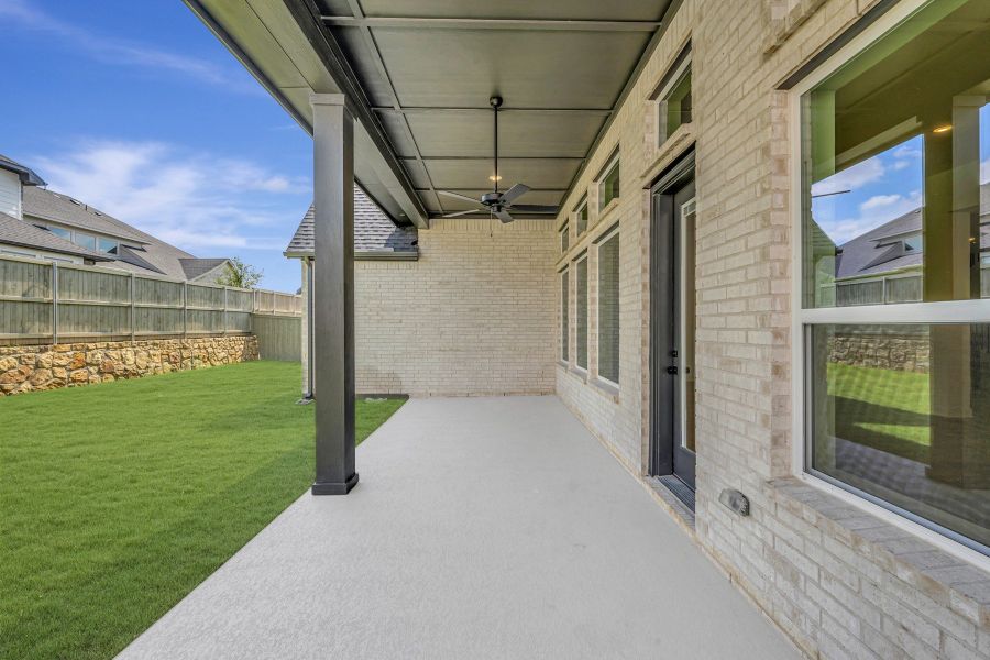 Exterior details and patio area of a home in Pecan Square – Classics, Northlake (Image 4).