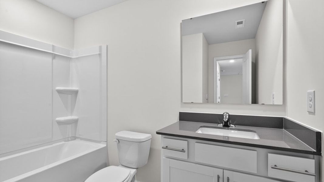 Furnished interior view inside a new home in Mason Ridge, Spring Lake (Image 9).