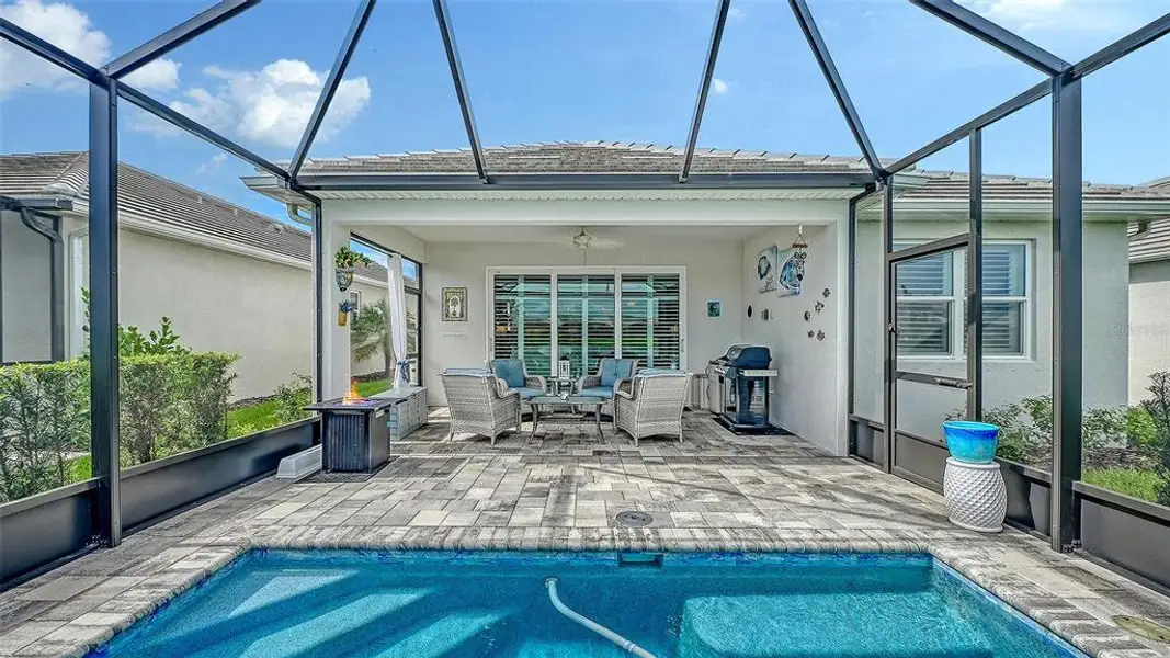 Exterior details and patio area of a home in LakeHouse Cove at Waterside, Sarasota (Image 24). Exterior details and patio area of a home in LakeHouse Cove at Waterside, Sarasota (Image 24).