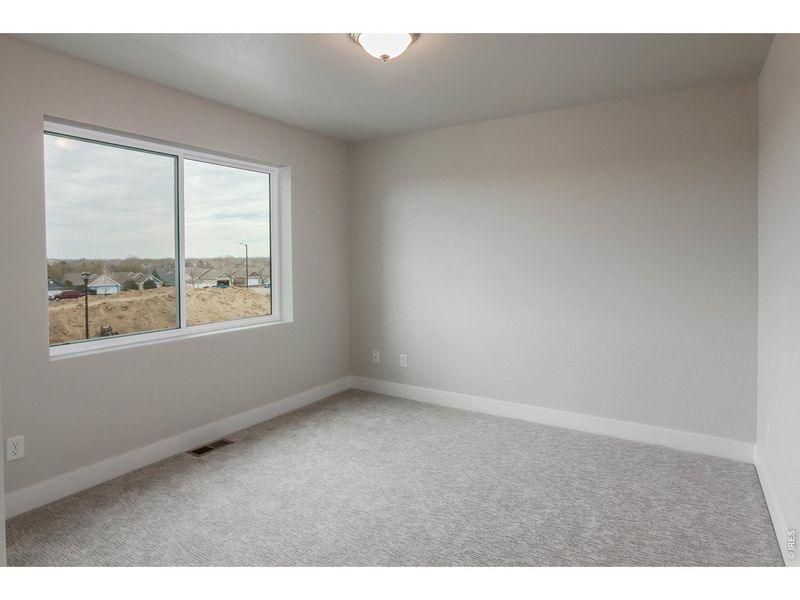 Spacious, unfurnished interior of a new home in Wilson Commons, Loveland (Image 39).