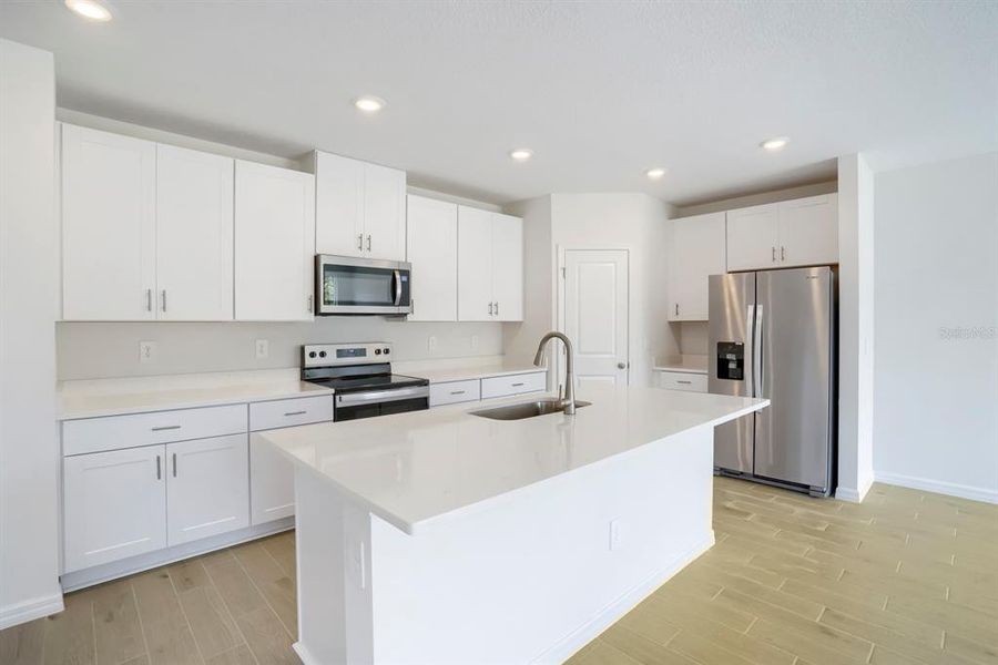Furnished interior view inside a new home in Salt Meadows - Classic Series, Parrish (Image 10).
