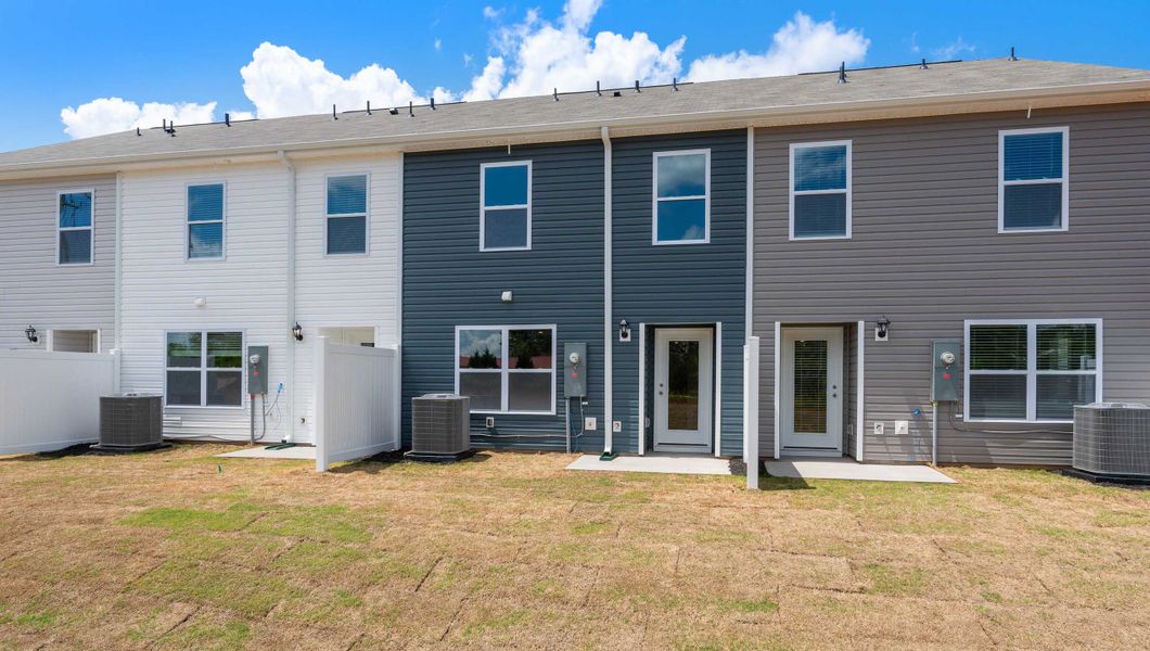 Front exterior of a new home in Covington Village, Greer, SC, highlighting curb appeal (Image 2).