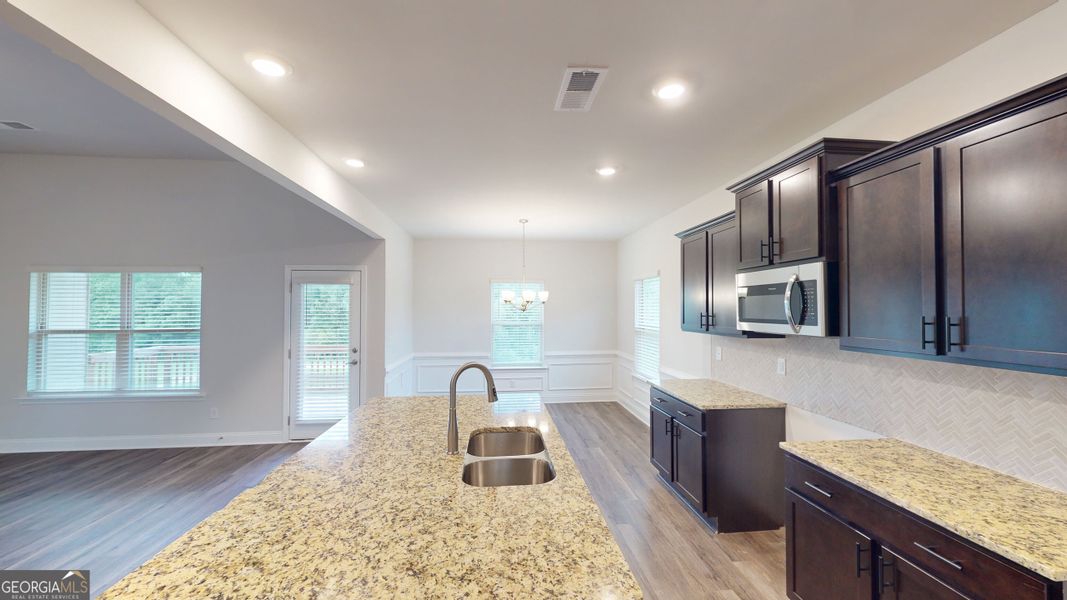 Furnished interior view inside a new home in Oakview Estates, Macon (Image 9).