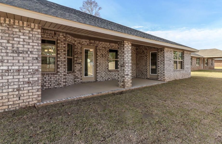 Exterior details and patio area of a home in Pecan Valley, Cantonment (Image 2). Exterior details and patio area of a home in Pecan Valley, Cantonment (Image 2).