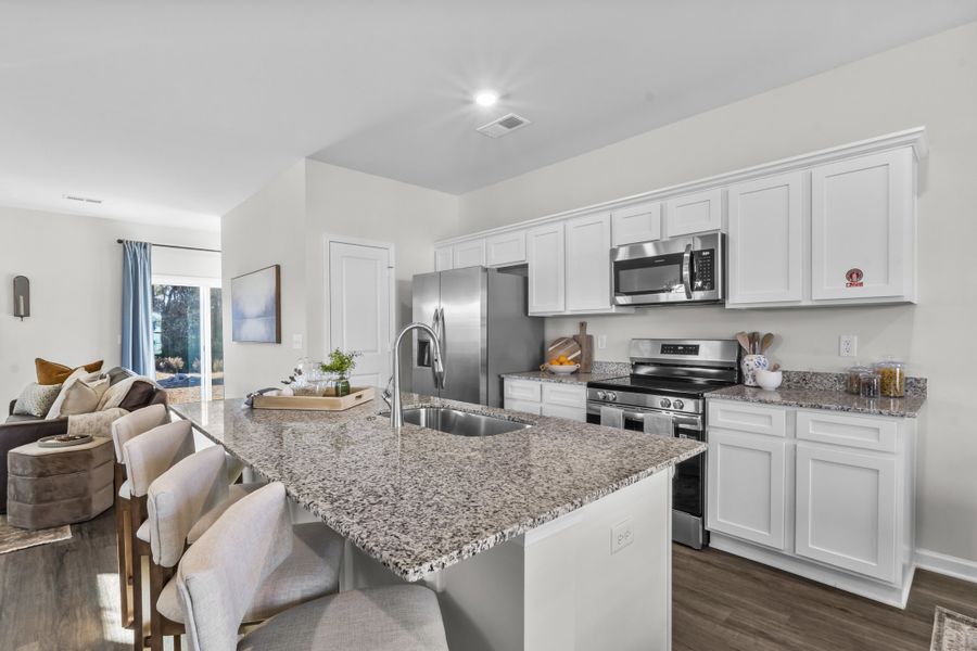 Representative furnished interior of a home built from the Hickory by McGuinn Homes in Greenlawn Village, Columbia (Image 7).