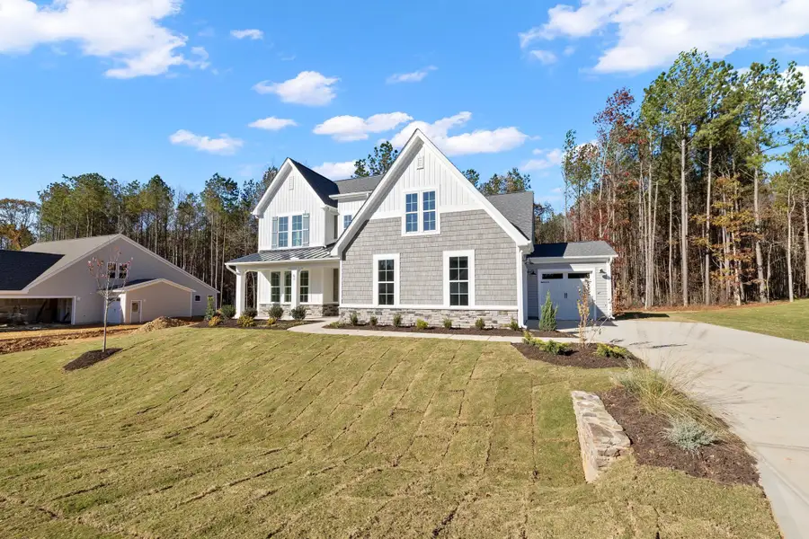 Representative exterior photo of a completed home built from the The Chandler by RobuckHomes in Baylee Ridge, Selma, NC (Image 41). Representative exterior photo of a completed home built from the The Chandler by RobuckHomes in Baylee Ridge, Selma, NC (Image 41).