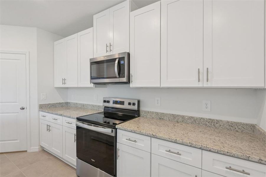 Furnished interior view inside a new home in Hilltop Vistas, Dade City (Image 5).