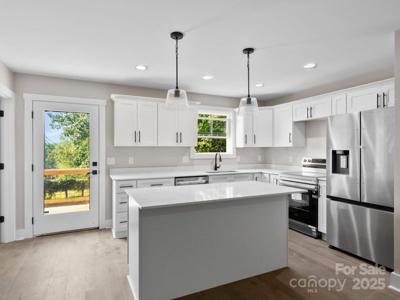 Furnished interior view inside a new home in , Candler (Image 3).