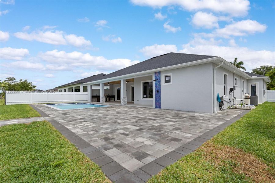 Front exterior of a new home in , Cape Coral, FL, highlighting curb appeal (Image 28). Front exterior of a new home in , Cape Coral, FL, highlighting curb appeal (Image 28).