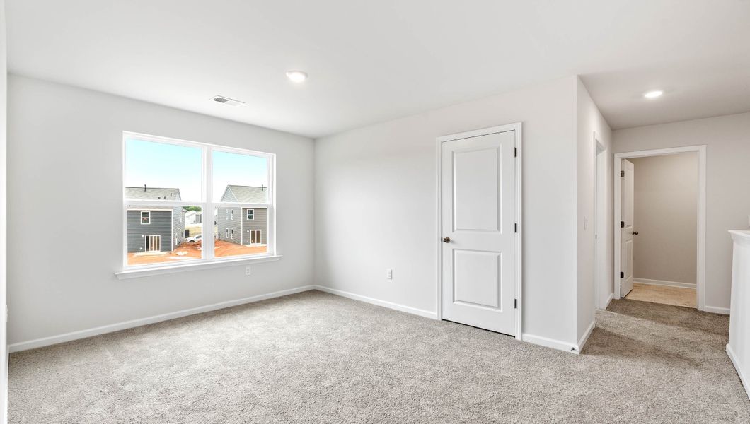 Spacious, unfurnished interior of a new home in Paddock Point, Roebuck (Image 27).